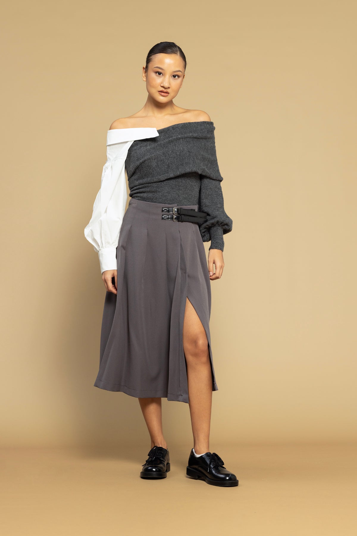 KEMER DETAYLI YIRTMAÇLI ETEK