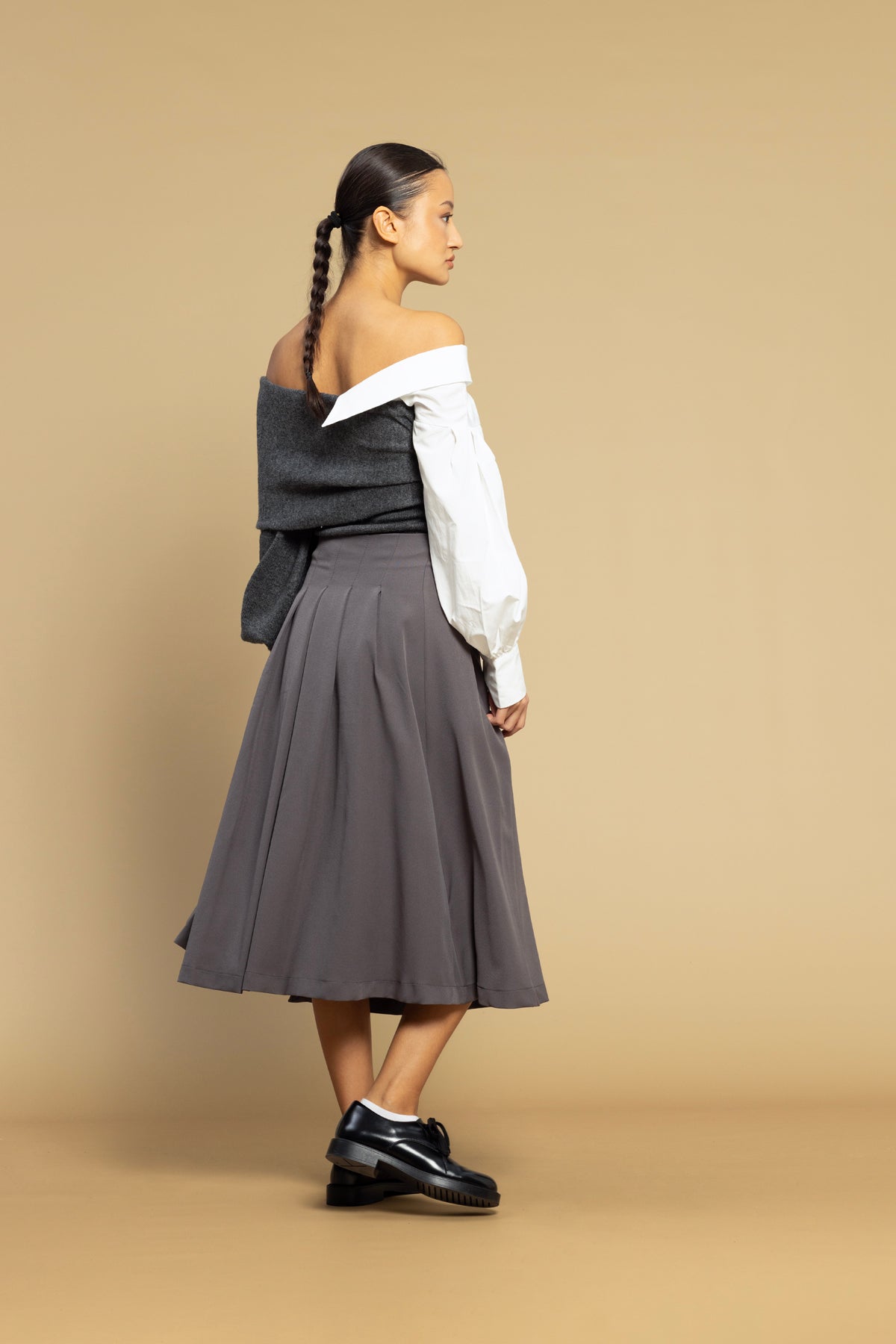 KEMER DETAYLI YIRTMAÇLI ETEK